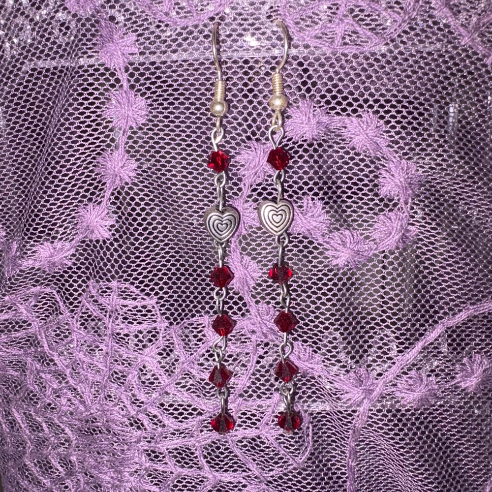 Silver and maroon dangly earrings